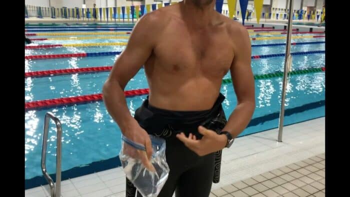 Thanks to this tutorial on getting into a high performance freediving suit - Gone are the alarmed looks and humiliating offers of help from passers-by as I struggle into my training suit.