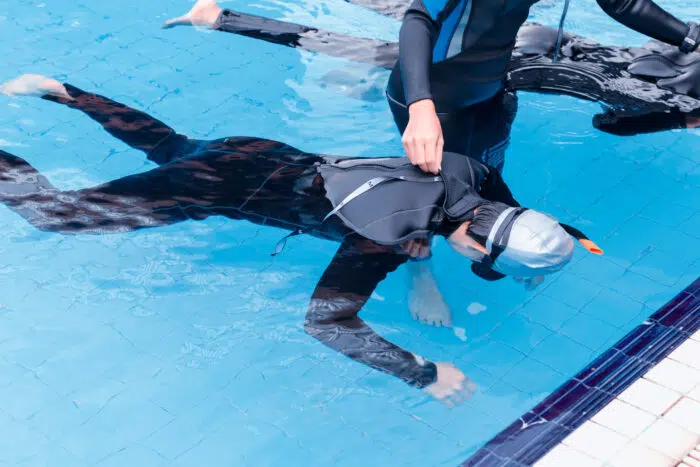 A freediving instructor teaching static breath-holds.