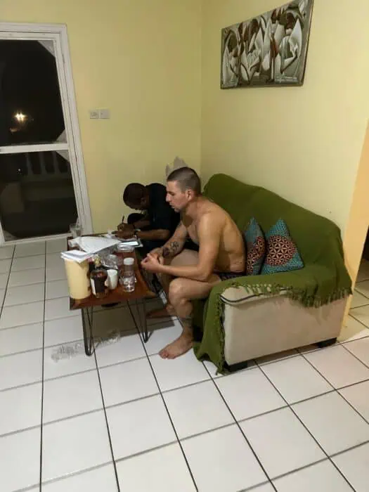 Petar Klovar undergoing doping control in Soufriere, Dominica with a doping control officer from the Caribbean Regional Anti-Doping Organization (RADO). Photo provided by Vitomir Maricic.