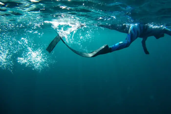 Surface Swimming with the Vertical Blue Blackfin (caught mid-arm-stroke)