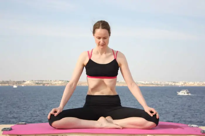 Emma Farrell in a Yoga Pose