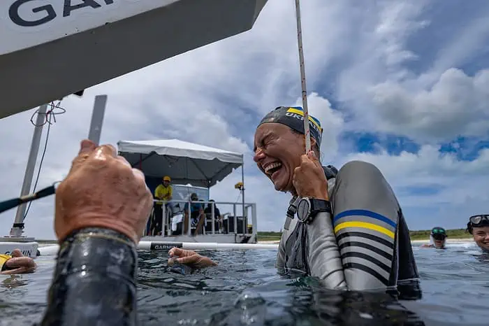 Ukranian freediver Kateryna Sadurska's big smile after a competition dive. Photo by Daan Verhoeven.